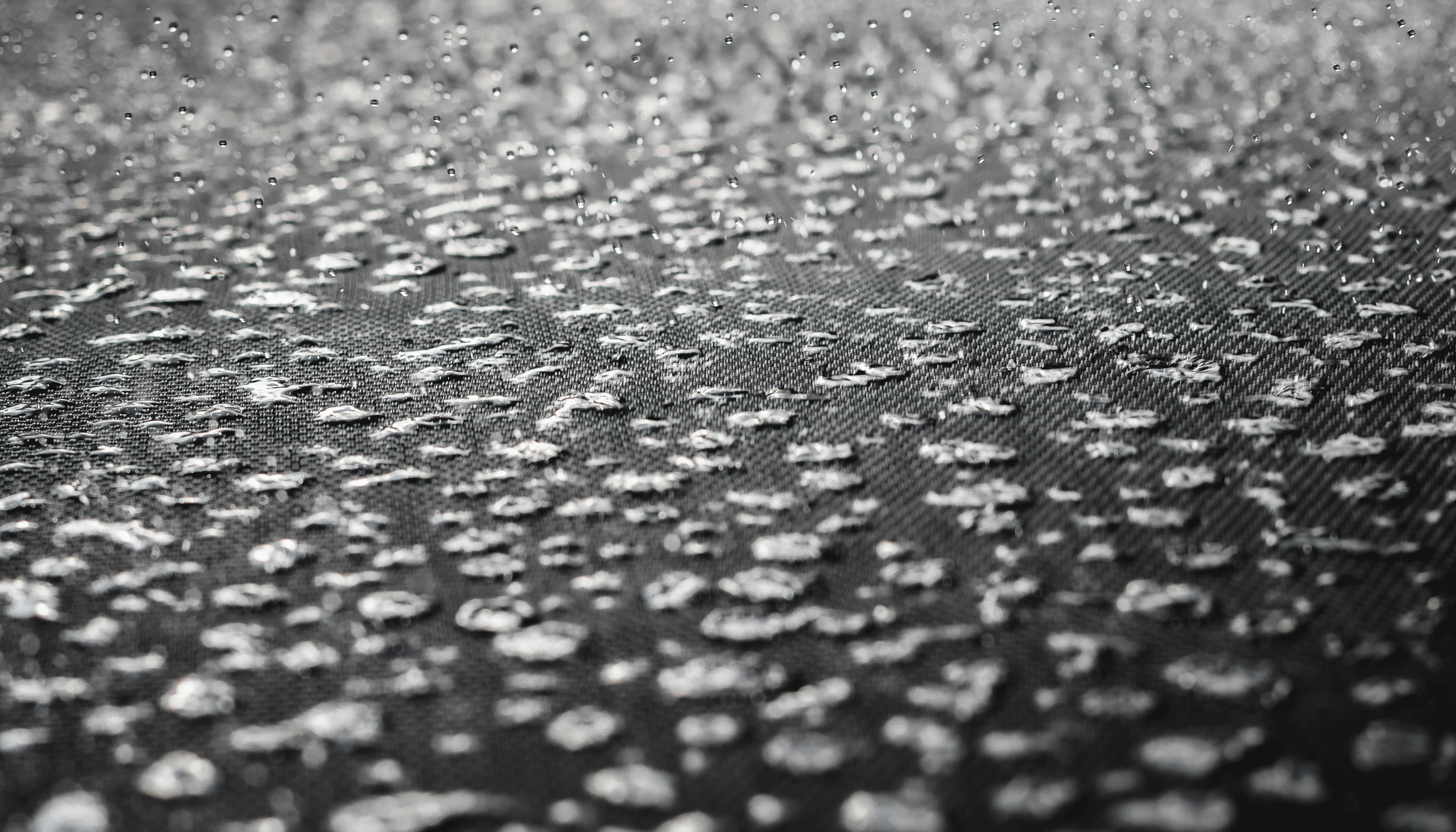 water droplets on black surface